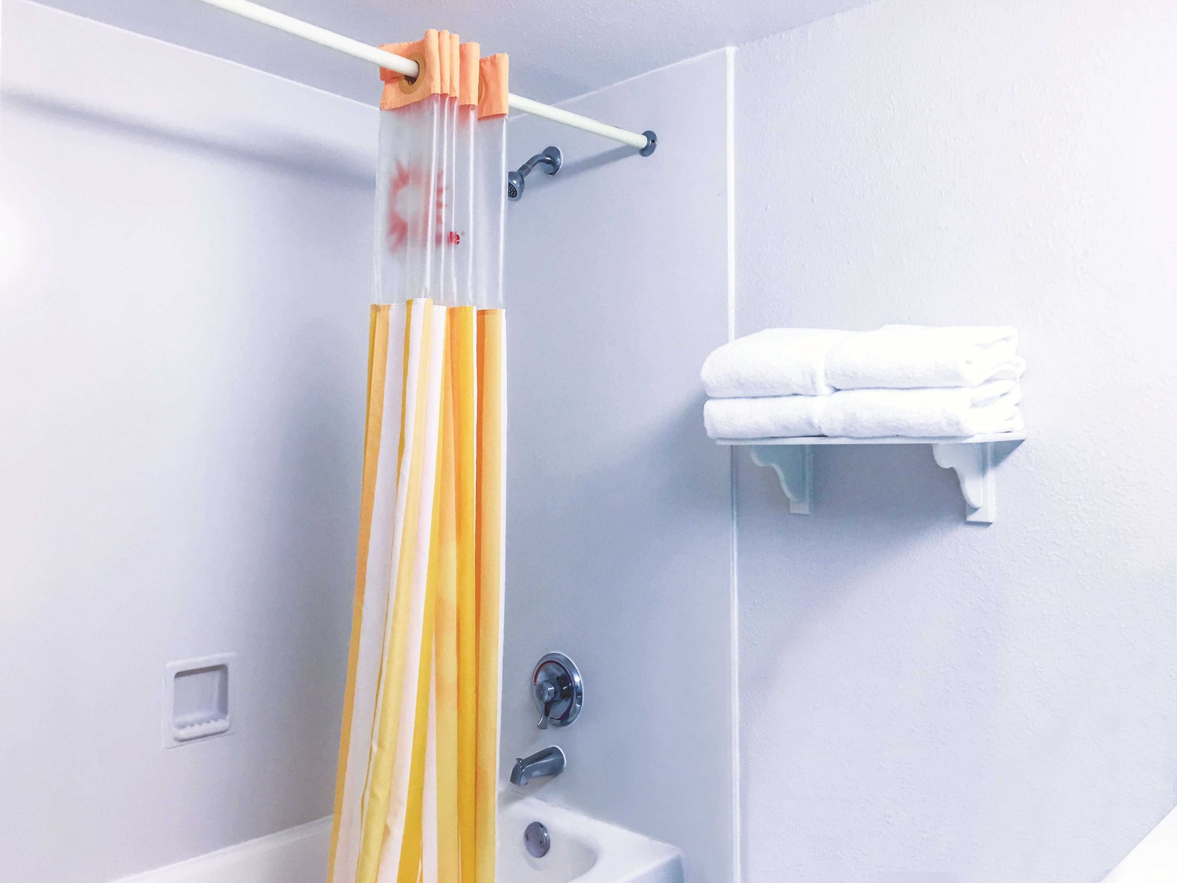 premium bedding, desk, laptop workspace, iron/ironing board