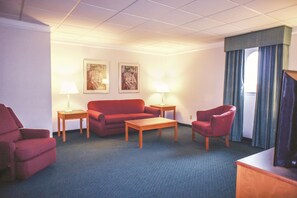 Premium bedding, desk, laptop workspace, iron/ironing board