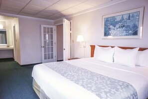 Premium bedding, desk, laptop workspace, iron/ironing board