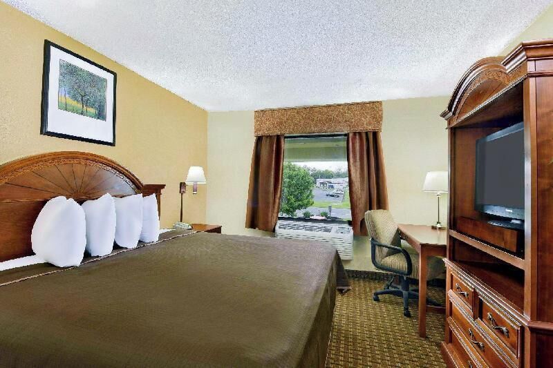 Desk, blackout drapes, soundproofing, iron/ironing board