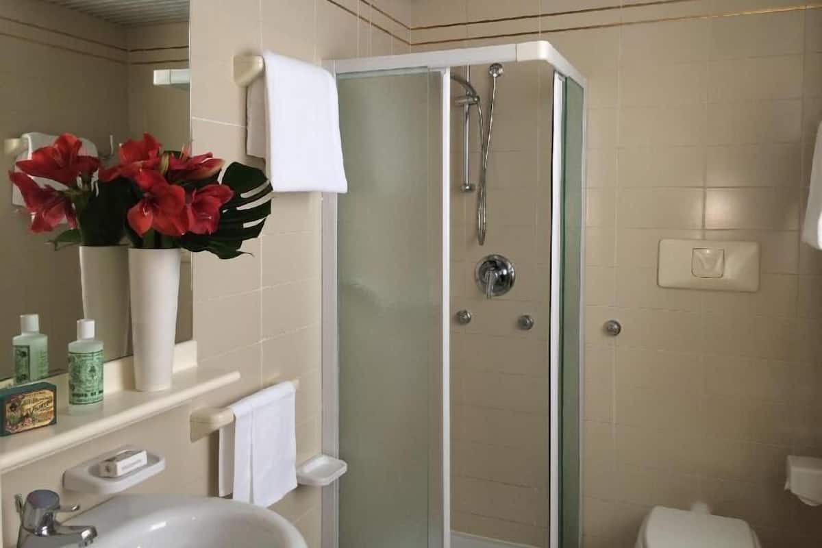 Bathroom | Shower, hair dryer, slippers, bidet