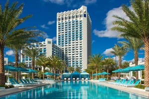 2 outdoor pools, a heated pool, cabanas (surcharge), pool umbrellas - Hilton Orlando Buena Vista Palace - Disney Springs® Area (Lake Buena Vista)