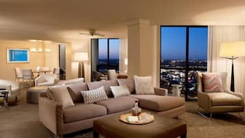 Presidential Suite, 1 Bedroom | Living area | 50-inch LCD TV with cable channels, TV, pay movies