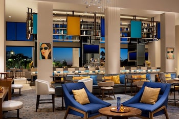 Hotel entrance and lobby at Hilton Orlando Buena Vista Palace - Disney Springs® Area