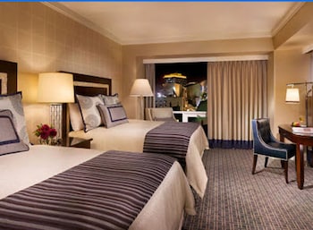 Premium bedding, pillowtop beds, in-room safe, desk at Omni Los Angeles Hotel at California Plaza