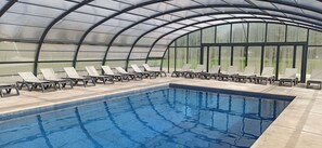 Indoor pool, outdoor pool, open 10:00 AM to 8:00 PM, pool umbrellas