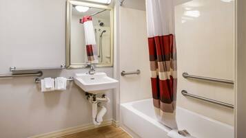 Deluxe Room, 1 King Bed, Accessible (Smoke Free) | Bathroom | Free toiletries, towels, soap, shampoo