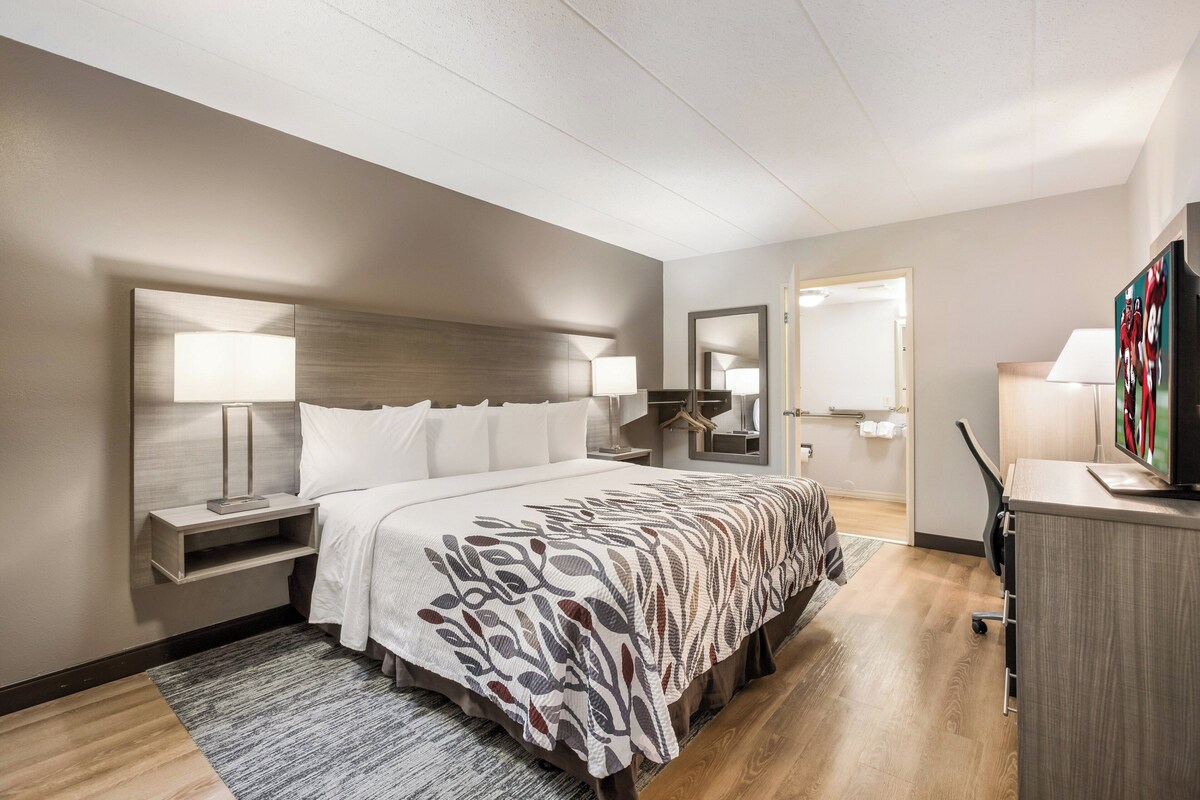 Desk, blackout drapes, cribs (free), WiFi (free)
