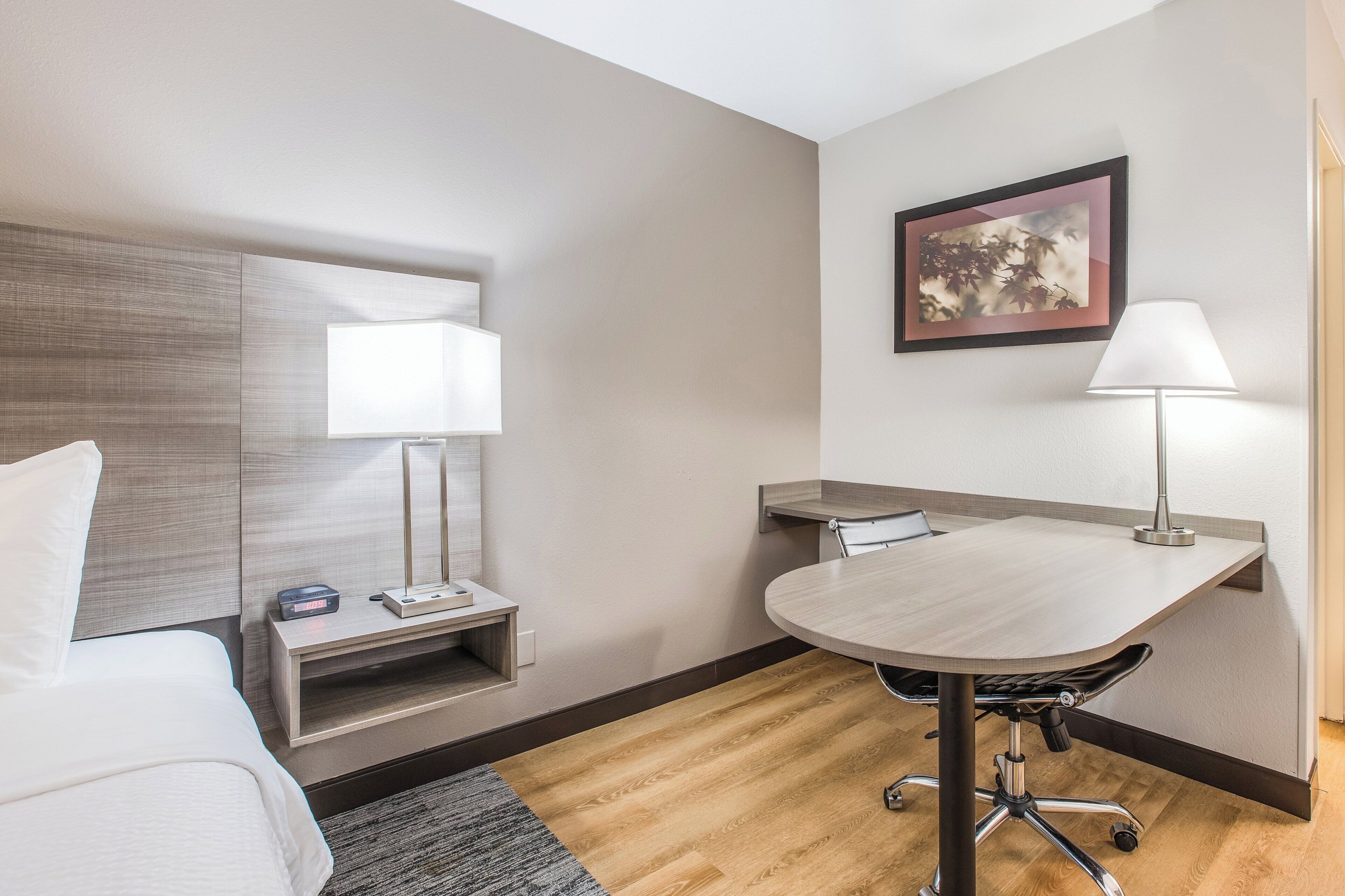 Desk, blackout drapes, cribs (free), WiFi (free)