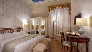 Premium bedding, down duvets, minibar, in-room safe