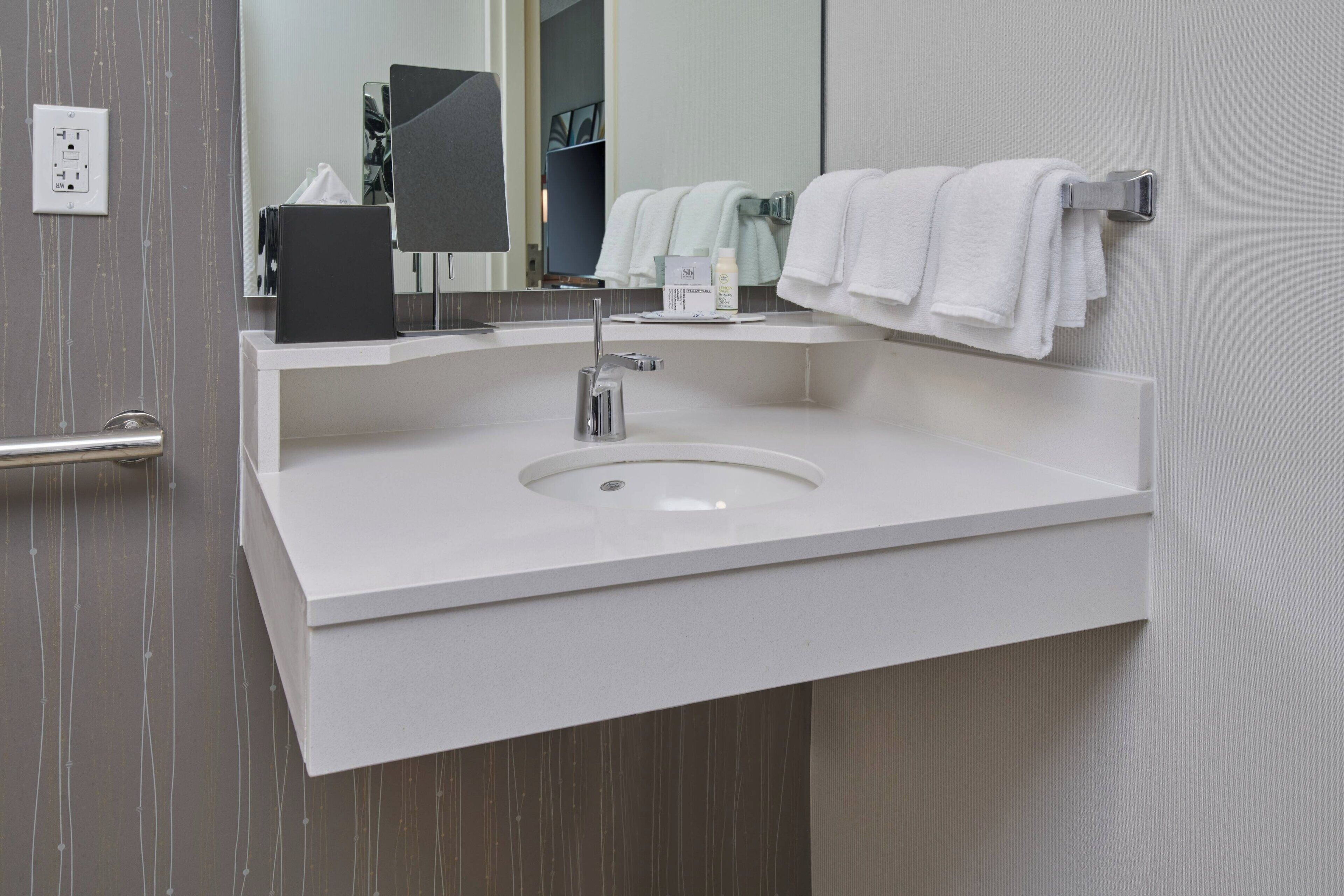 combined shower/bathtub, free toiletries, hair dryer, towels