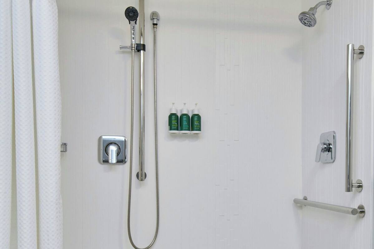 A walk-in shower with a handheld showerhead, a handheld showerhead, a handheld showerhead, a handheld showerhead, a handheld showerhead, a handheld showerhead, a handheld showerhead, a handheld showerhead, a handheld showerhead, a handheld showerhead, a handheld showerhead, a handheld showerhead, a handheld showerhead, a handheld showerhead, a handheld showerhead, a handheld showerhead, a handheld showerhead, a handheld showerhead, a handheld showerhead, a handheld showerhead, a handheld showerhead, a handheld showerhead, a handheld showerhead, a handheld showerhead, a handheld showerhead, a handheld showerhead, a handheld showerhead, a handheld showerhead, a handheld showerhead, a handheld showerhead, a handheld showerhead, a handheld showerhead, a handheld showerhead, a handheld showerhead, a handheld showerhead, a handheld showerhead, a handheld showerhead, a handheld showerhead, a handheld