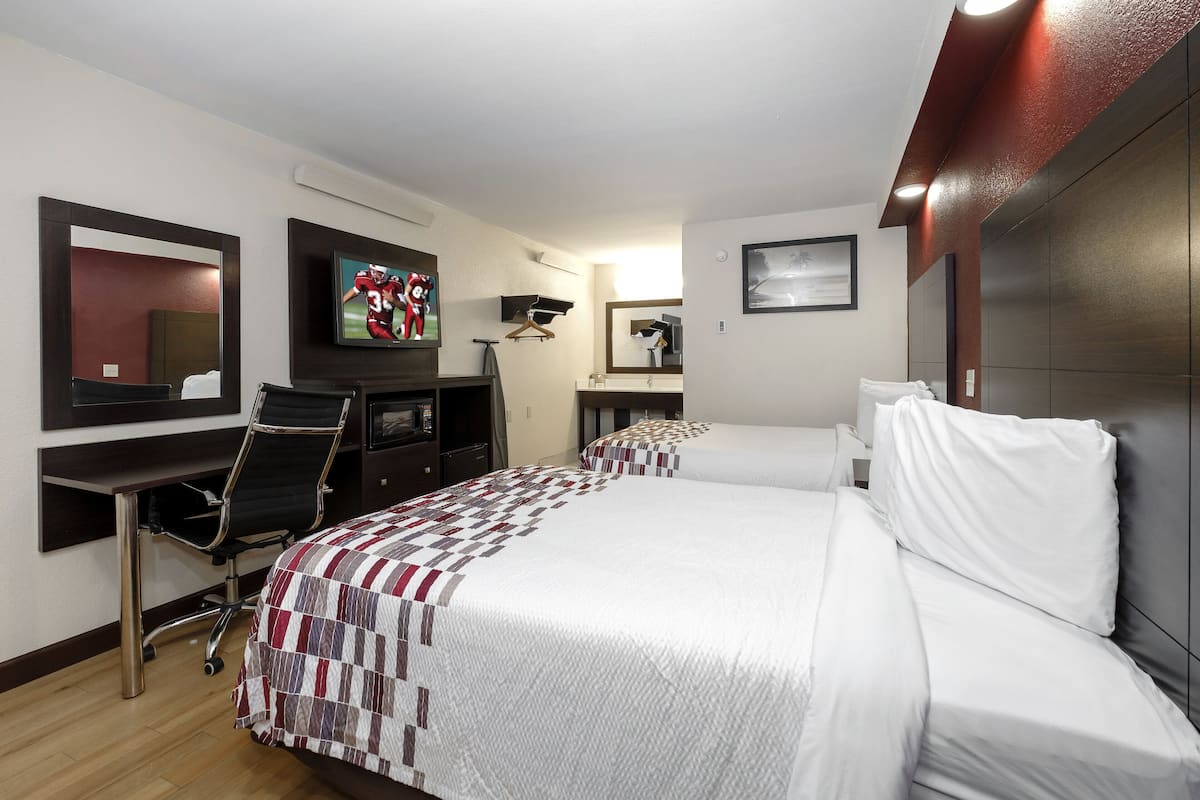 Deluxe Room, 2 Double Beds, Non Smoking | Desk, laptop workspace, blackout drapes, iron/ironing board