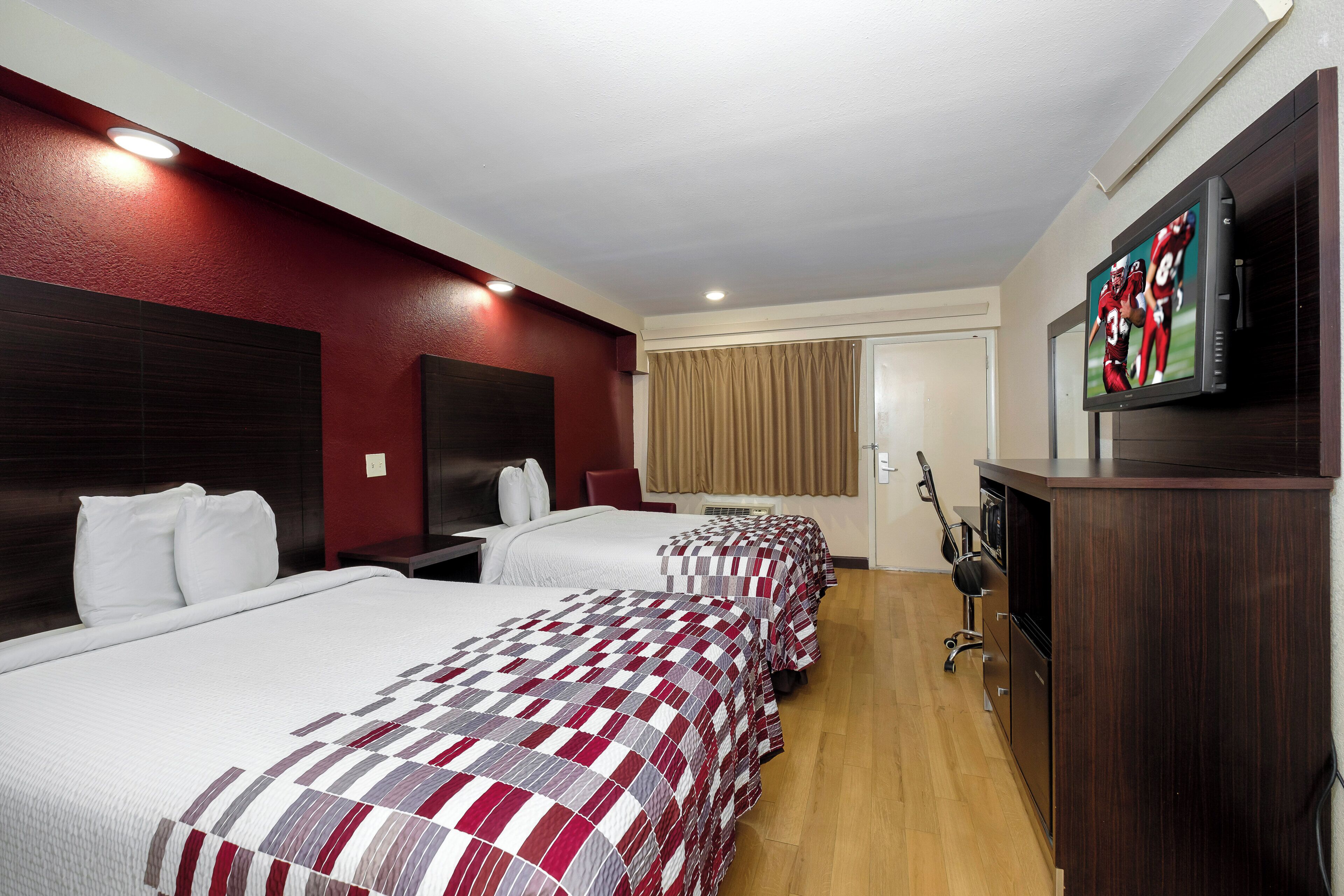 Deluxe Room, 2 Double Beds, Non Smoking | Desk, laptop workspace, blackout drapes, iron/ironing board (on request)