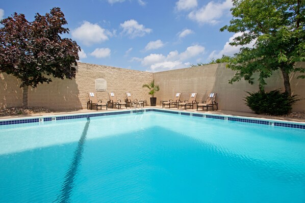 Seasonal outdoor pool, open 9:00 AM to 5:00 PM, sun loungers