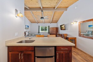 Deluxe Room, Kitchenette | 1 bedroom, desk, free WiFi, bed sheets