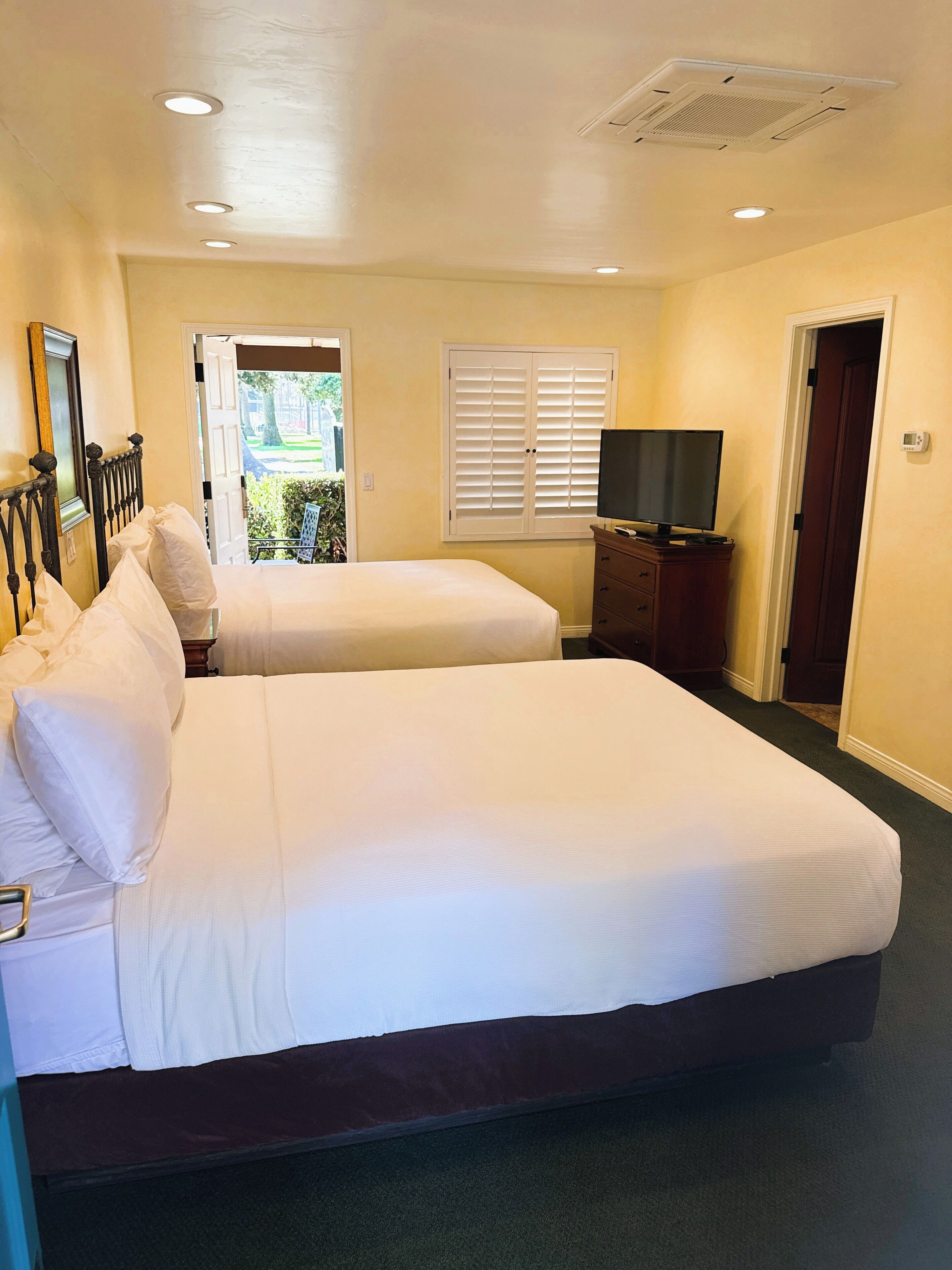 room, 2 queen beds, patio | iron/ironing board, free wifi, bed sheets, alarm clocks