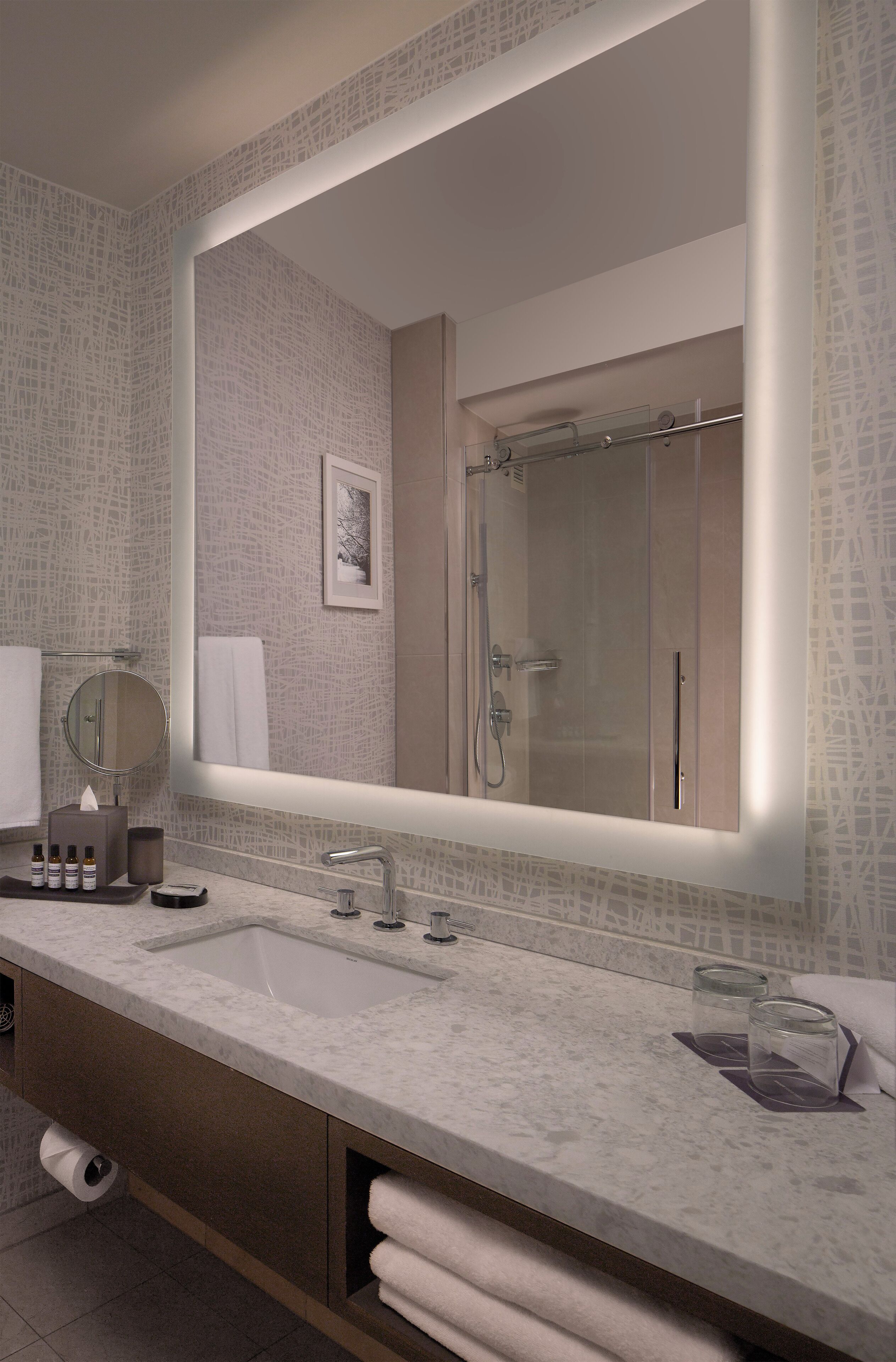 combined shower/bathtub, designer toiletries, hair dryer, towels