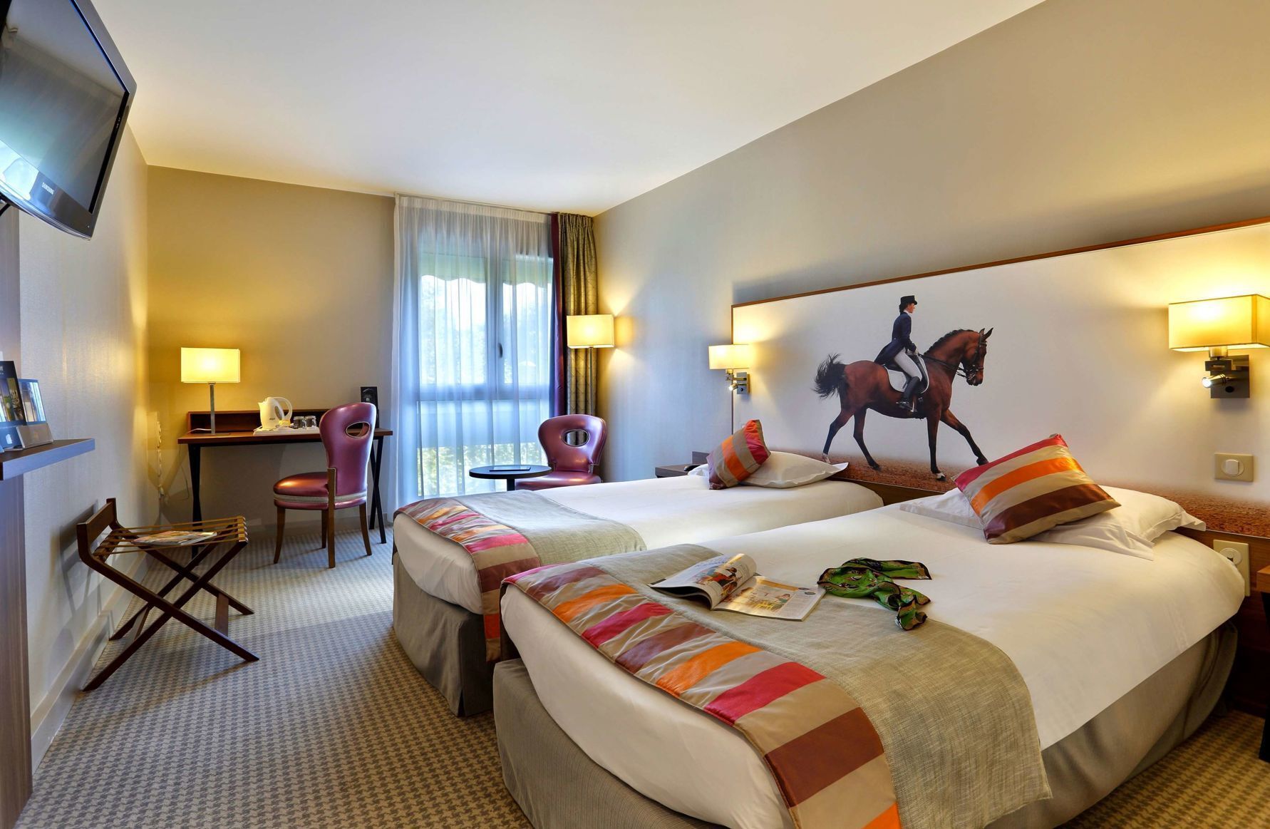 Premium bedding, down comforters, pillowtop beds, in-room safe