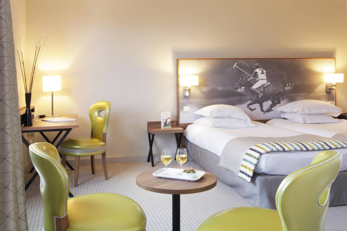 Premium bedding, down comforters, pillowtop beds, in-room safe