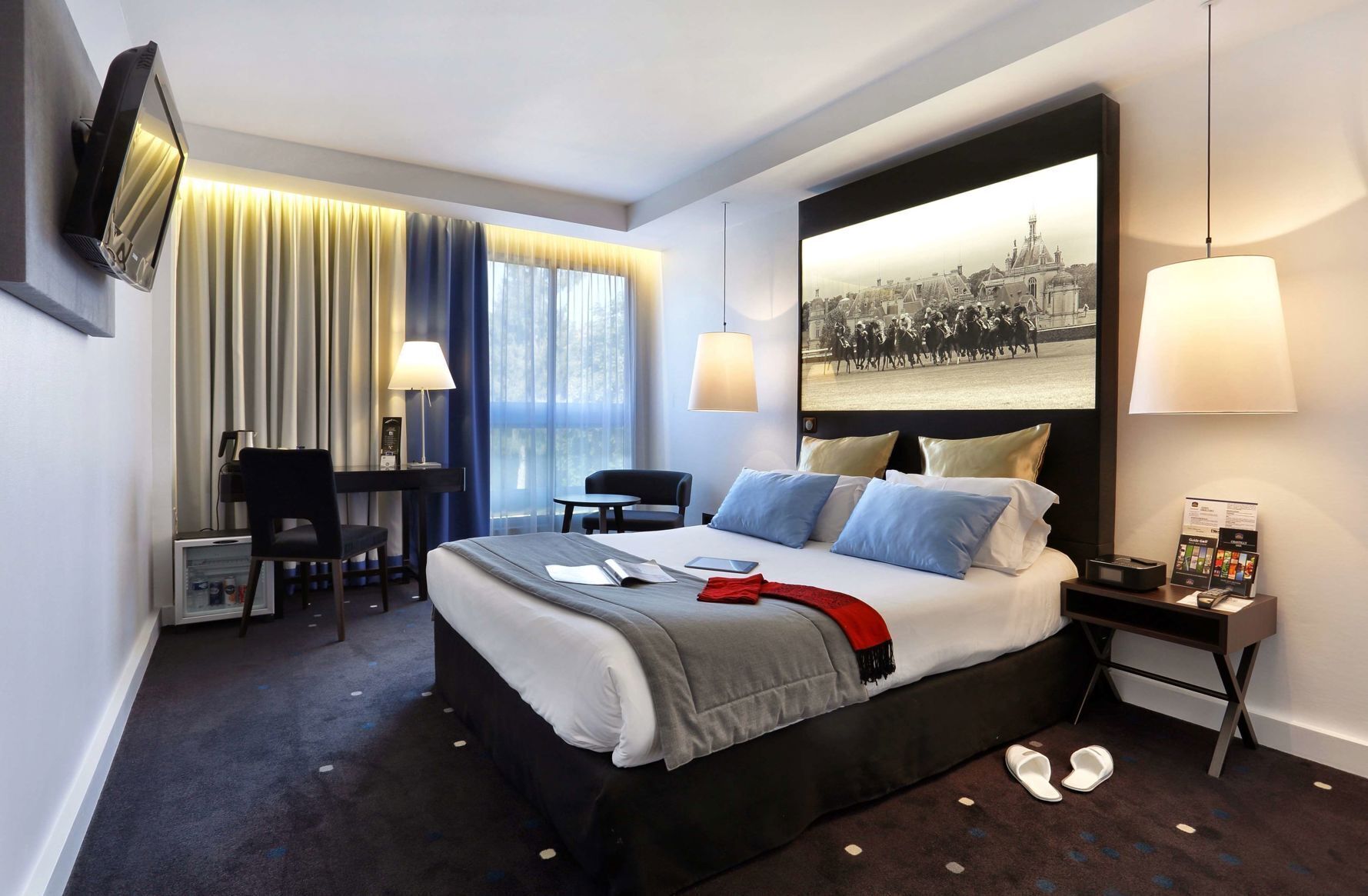 Premium bedding, down comforters, pillowtop beds, in-room safe
