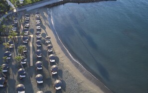 On the beach, sun loungers, beach umbrellas, beach towels - Amathus Beach Hotel Limassol (Limassol)