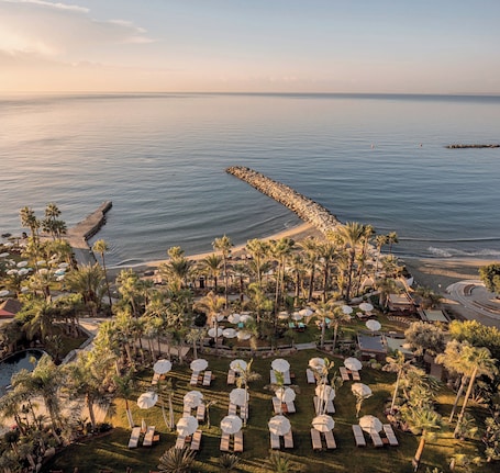 Indoor pool, 2 outdoor pools, pool umbrellas, sun loungers. Amathus Beach Hotel Limassol