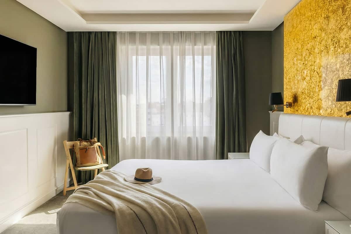 Habitación Deluxe | Ropa de cama de alta calidad, edredón, minibar y muebles diferentes