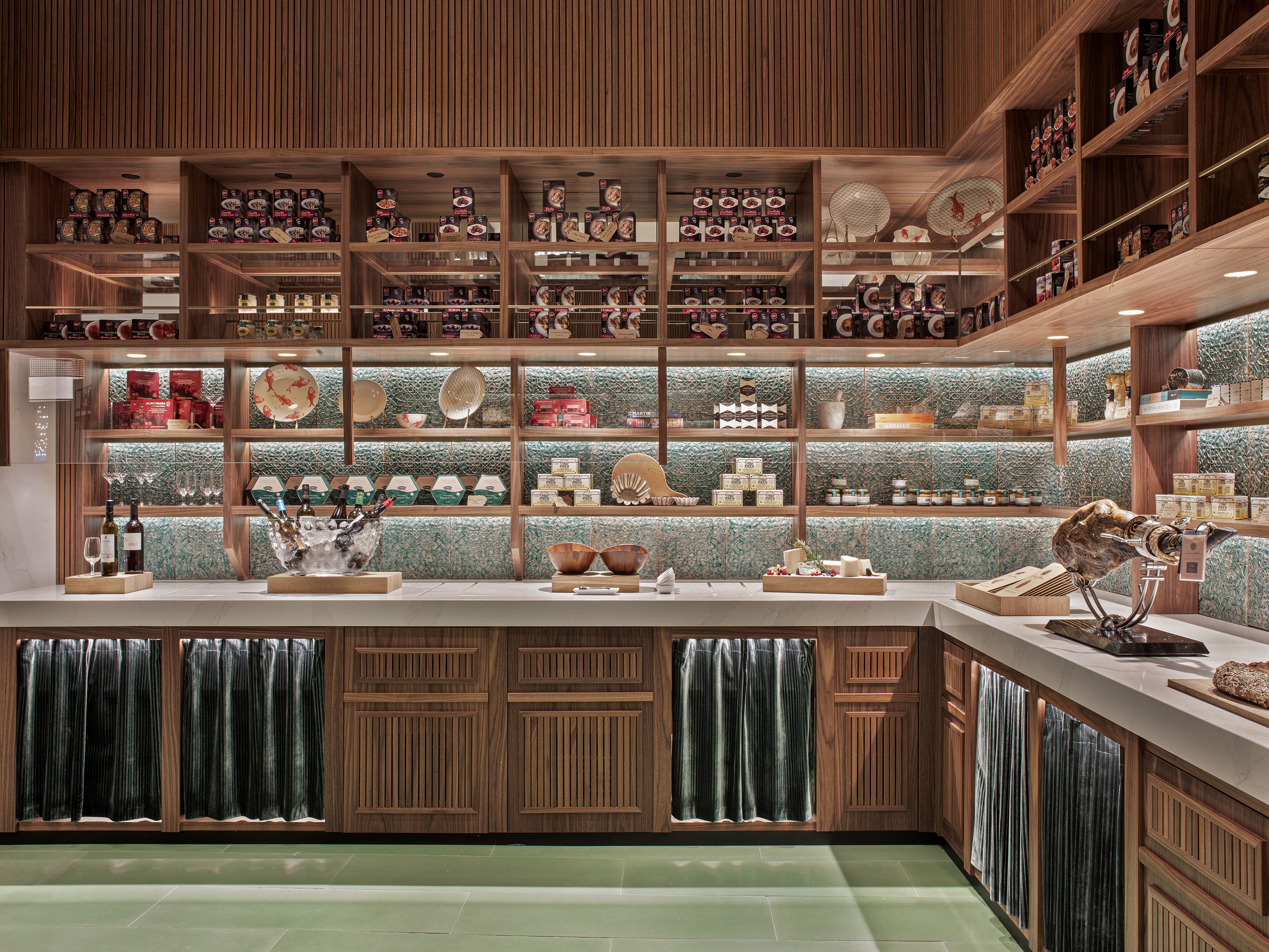 A well-organized retail space with wooden shelving displaying various products.
