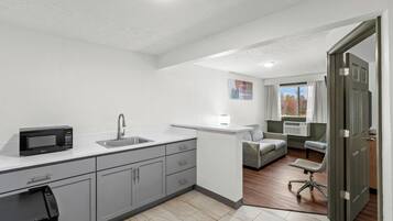 Desk, blackout drapes, iron/ironing board, free cribs/infant beds