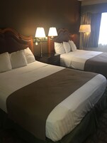 Deluxe Double Room | Desk, laptop workspace, blackout drapes, iron/ironing board