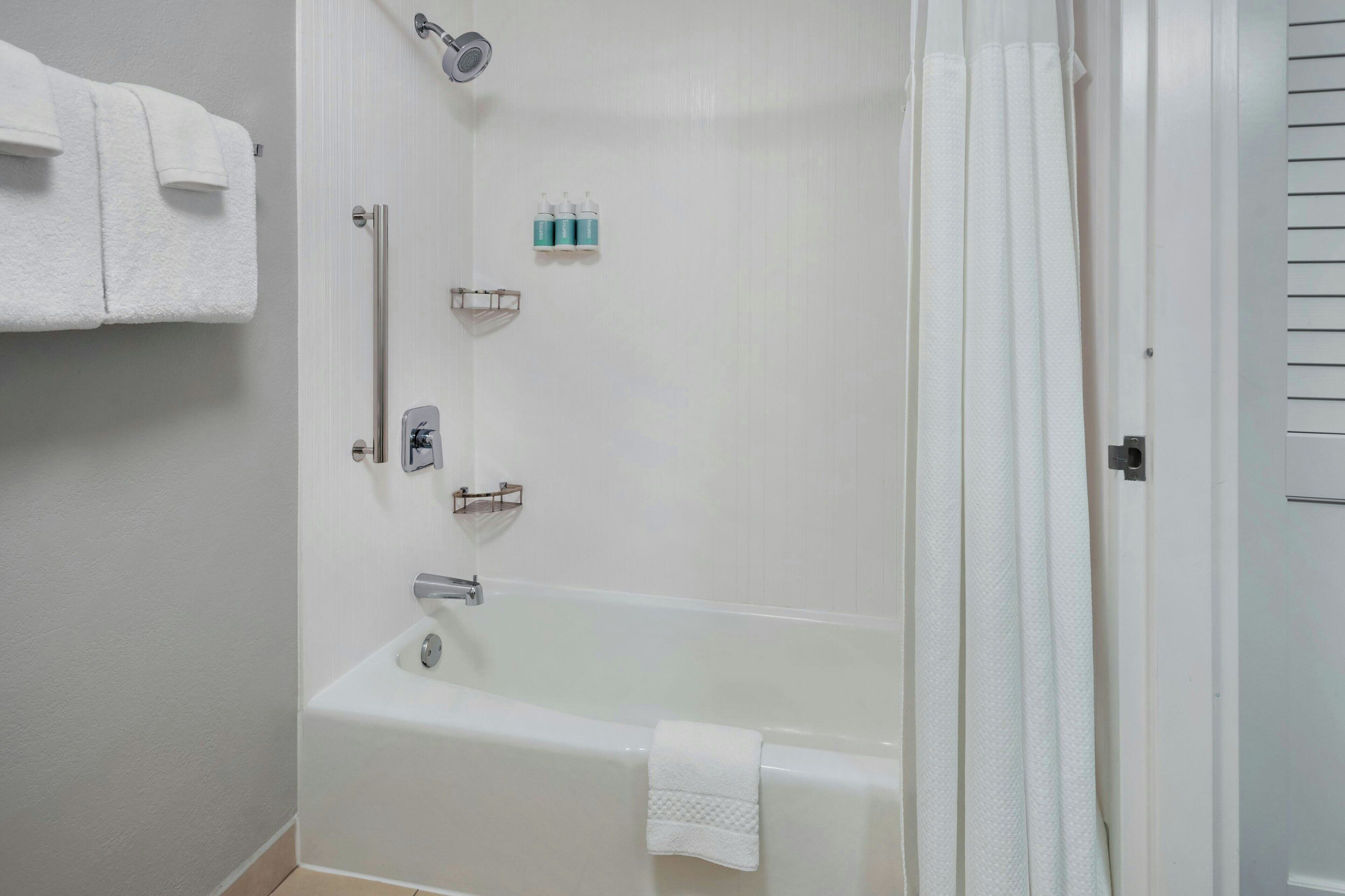 combined shower/bathtub, free toiletries, hair dryer, towels