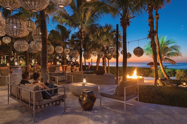 4 bars/lounges, swim-up bar, poolside bar, beach bar
