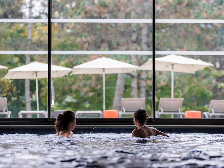 Seasonal outdoor pool, open 10:00 AM to 8:00 PM, pool umbrellas
