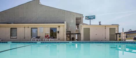 Seasonal outdoor pool, pool loungers