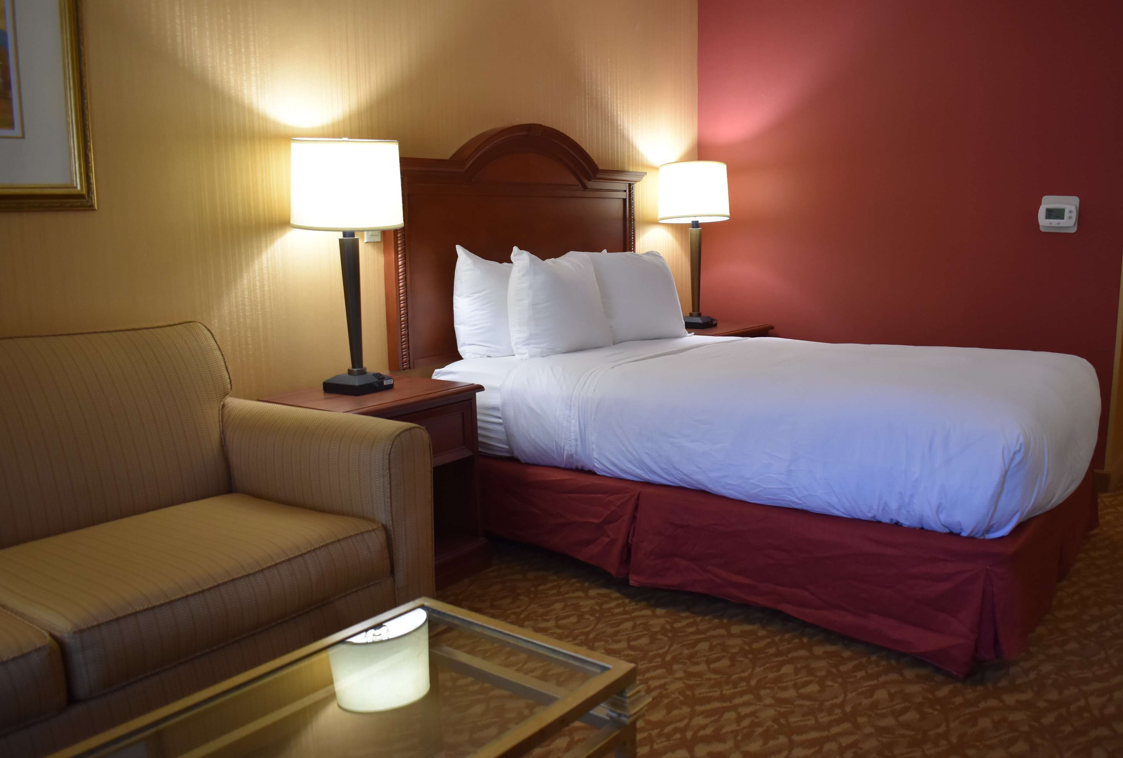 Premium bedding, down comforters, pillowtop beds, minibar