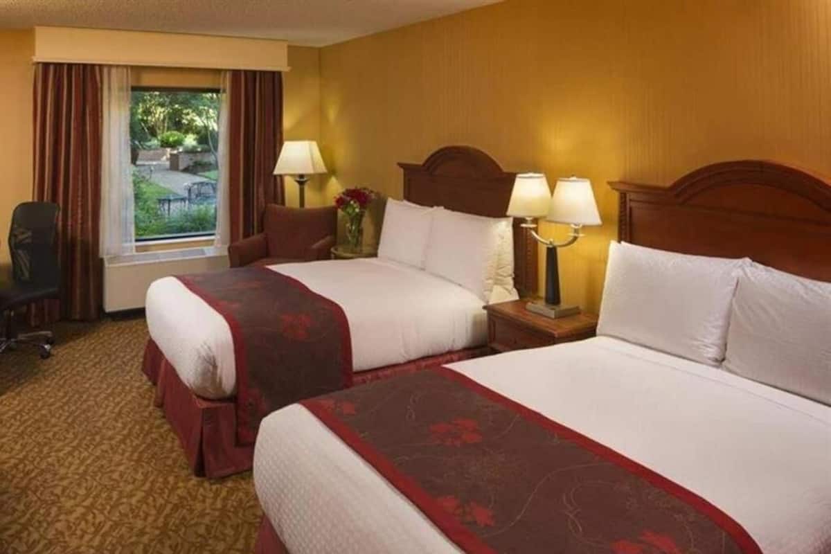 Premium bedding, down comforters, pillowtop beds, minibar