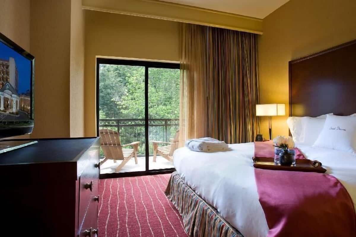 Premium bedding, down comforters, pillowtop beds, minibar