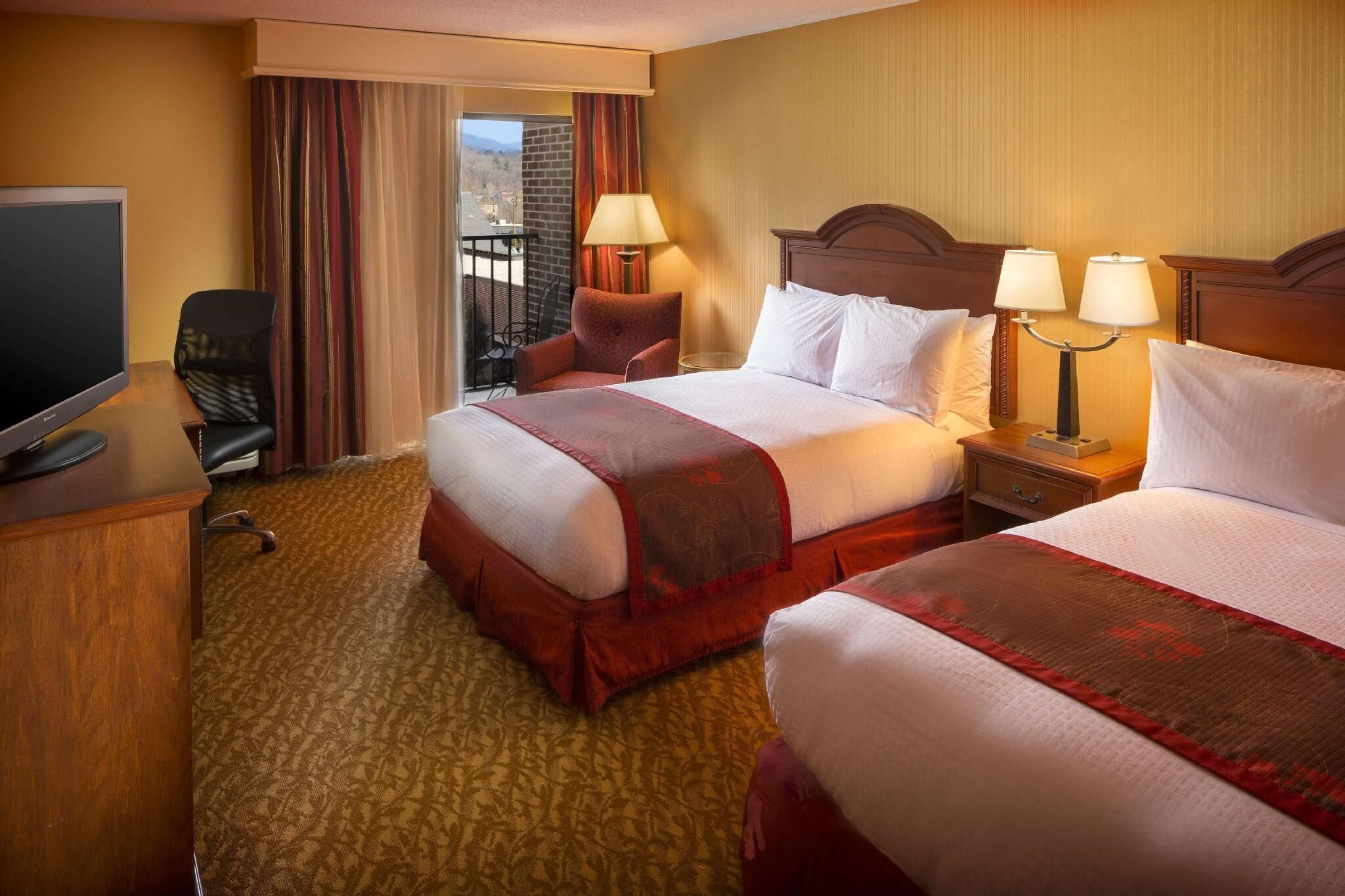 Premium bedding, down comforters, pillowtop beds, minibar