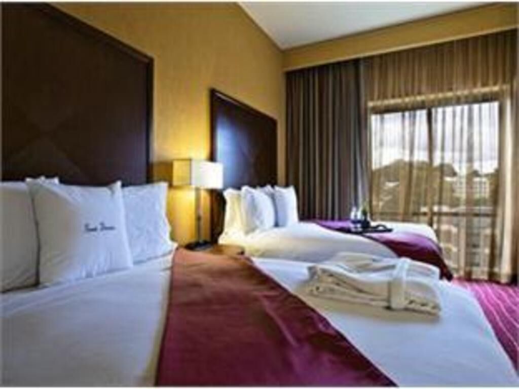 Premium bedding, down duvets, pillow-top beds, minibar