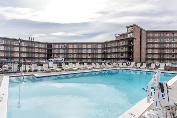 Outdoor pool, open 8:00 AM to 10 PM, pool loungers