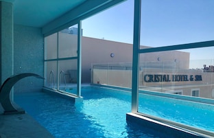 Indoor pool, seasonal outdoor pool, pool umbrellas, sun loungers