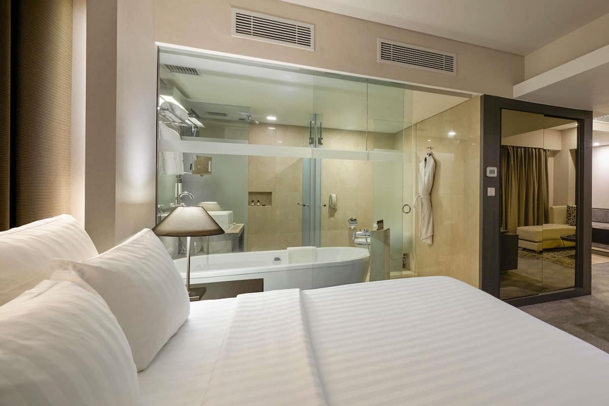 Ropa de cama de alta calidad y minibar