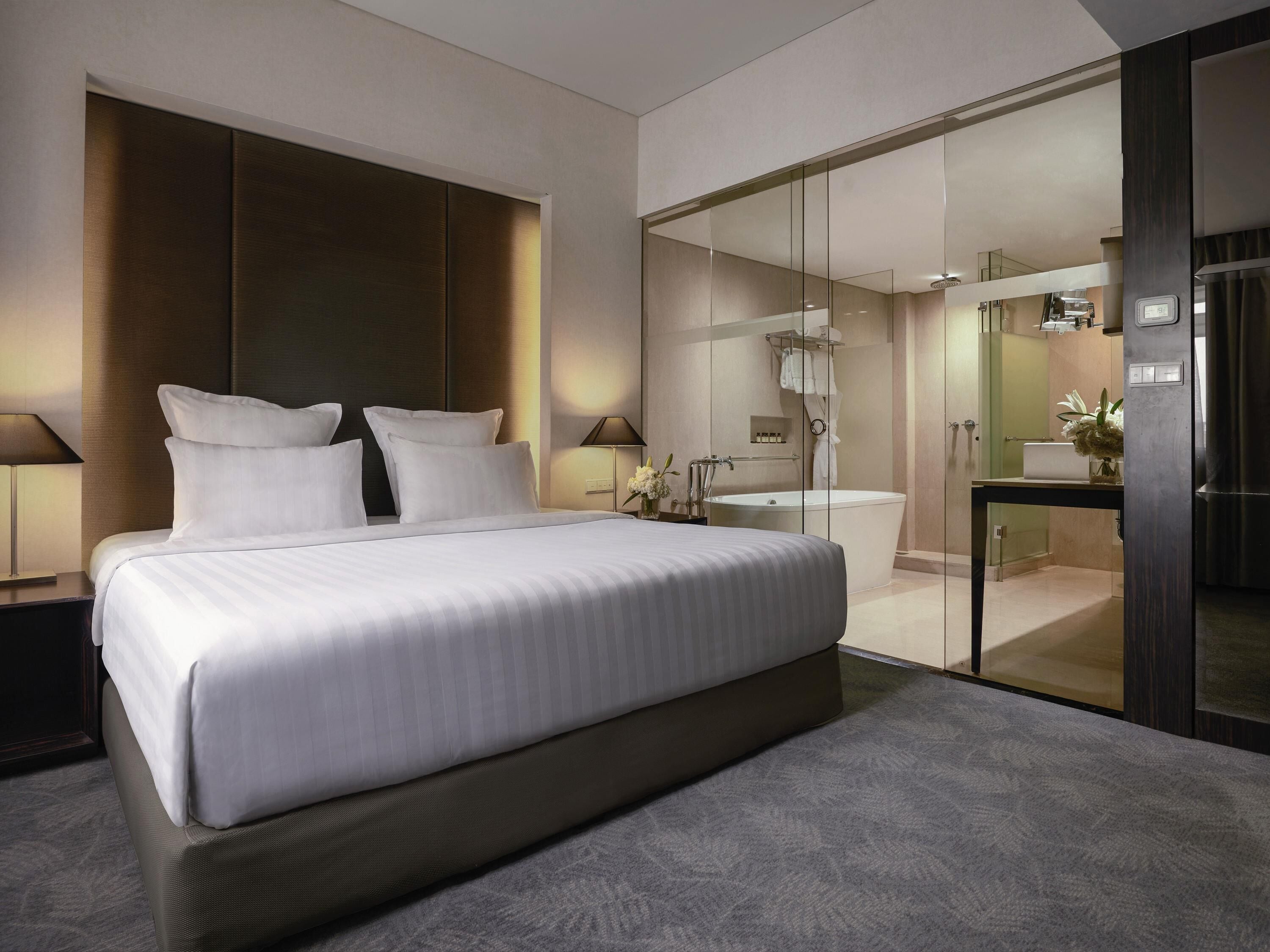 Departamento Deluxe, 1 cama King size | Ropa de cama de alta calidad y minibar 