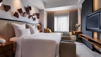 Ropa de cama de alta calidad y minibar