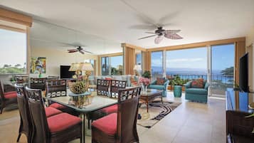 Premium Suite (1 Bedroom Ocean View) | Living area | 50-inch LCD TV with cable channels, TV