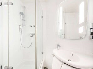 Shower, eco-friendly toiletries, hair dryer, towels