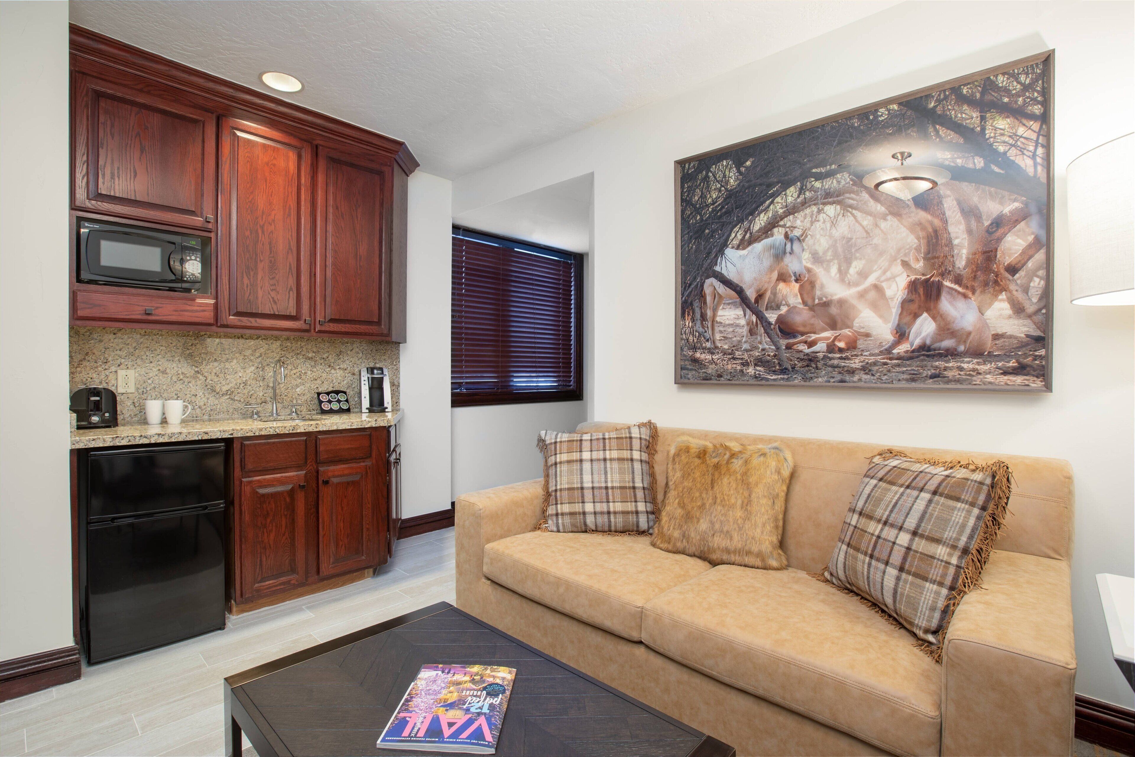 suite, 1 queen bed with sofa bed, non smoking | private kitchen | fridge, microwave, coffee/tea maker, dining tables