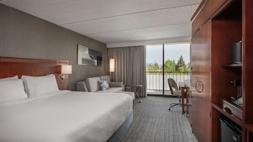 Hypo-allergenic bedding, desk, laptop workspace, blackout curtains