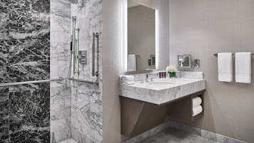 Designer toiletries, hair dryer, bathrobes, slippers